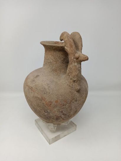 null Jug with ovoid body, neck and handle in the shape of an ibex

Beige and ochre...