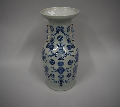 null CHINA - Late 19th century

A celadon green and blue underglaze porcelain baluster...