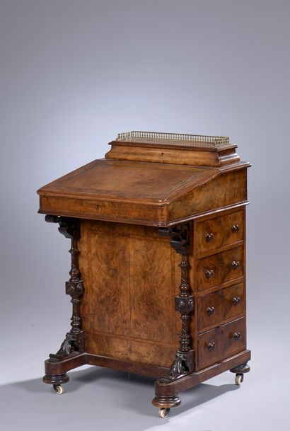 null Davenport writing desk in burr walnut veneer, light and blackened wood fillets,...