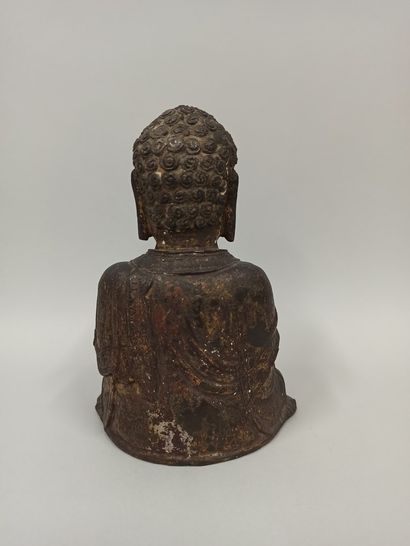 null CHINE - Epoque MING (1368 - 1644)

Statuette en bronze à patine brune à traces...
