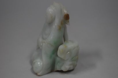 null CHINA - 20th century

Jadeite group of guanyin sitting on a rock. 

H.: 7,3...
