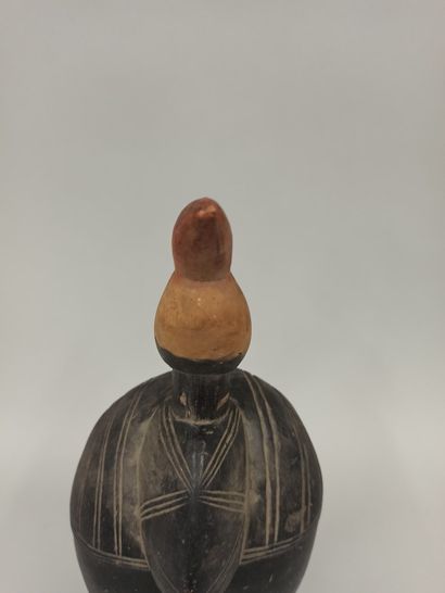 null Petit masque Baoulé décoré d’un oiseau 

H.: 26 cm