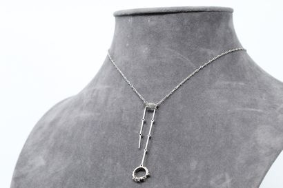 null Necklace in 18k (750) white gold with diamonds. 

Accidents and missing pieces....