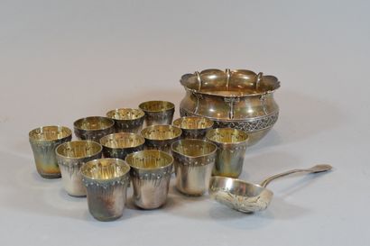 null 
Lot of silverware including:

- 12 goblets

- a sprinkling spoon

- a bowl...