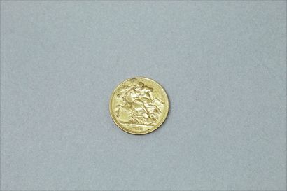 null Gold coin of 1 George V sovereign (1912). 

Weight : 7.92 g.