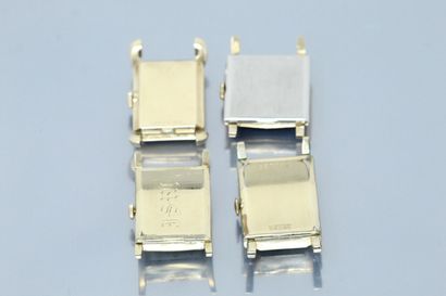 null Lot of four gilt and silvered metal watch cases. 

Three are signed GRUEN, the...