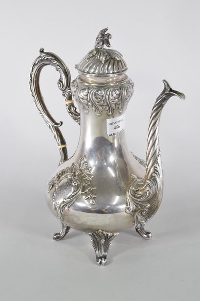 null Four-legged silver teapot (Minerva), the body decorated with monogrammed cartouches...