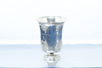  A silver tulip tumbler, standing on a pedestal...