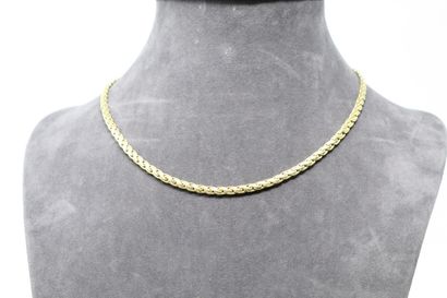  Necklace in yellow gold 18k (750) with flat mesh. 
Necklace size : 45 cm - Weight...