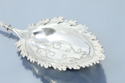 null A silver spoon with a leafy cup and a spatula decorated in the renaissance style.

Eastern...