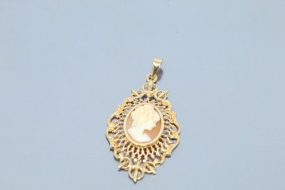  An 18k (750) yellow gold pendant set with a shell cameo representing the portrait...