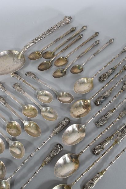 null 
Lot of silverware including :

- A rice spoon. Cambodia.

- Six small spoons....