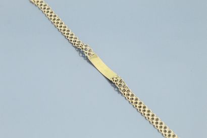 null Curb in 18k (750) yellow gold, engraved "Eliane

Wrist size : 18.5 cm. - Weight...