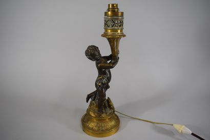 Bronze lamp representing a putto, a cymbal...