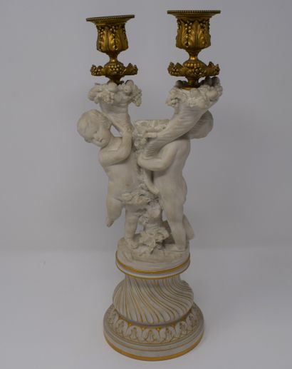 null Manufacture de Sèvres

A biscuit candlestick with two arms of light representing...