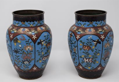 
A pair of cloisonné vases on a copper base,...