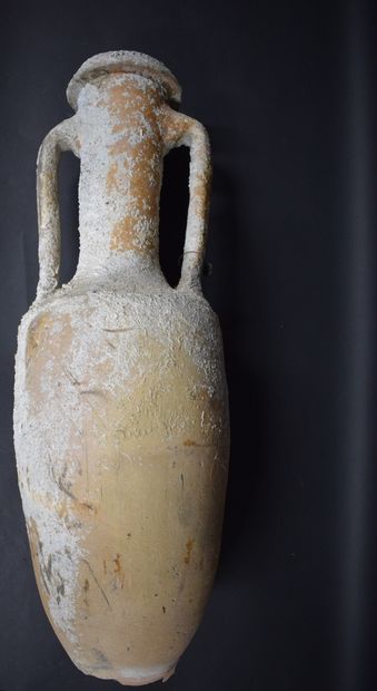 null Amphora of the Dressel 1A type with two terracotta handles.

Probably Italy,...