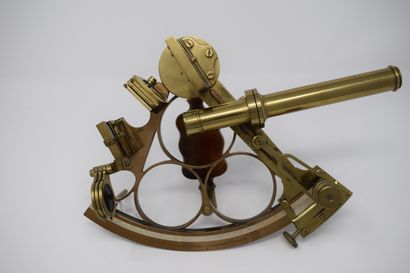 null Three-circle brass frame sextant with turned wooden handle, divisions on silver...