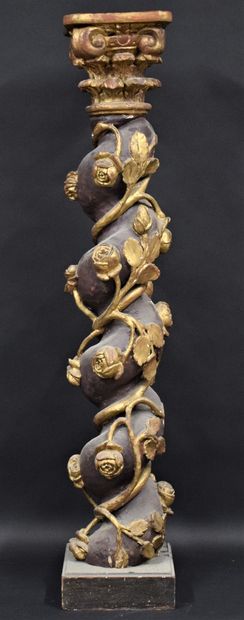 null Torso column 

in polychrome and gilded wood decorated on its shaft with carved...