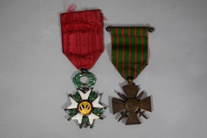 null Two military medals:

- Silver Legion of Honor (Boar), officer, Third Republic...