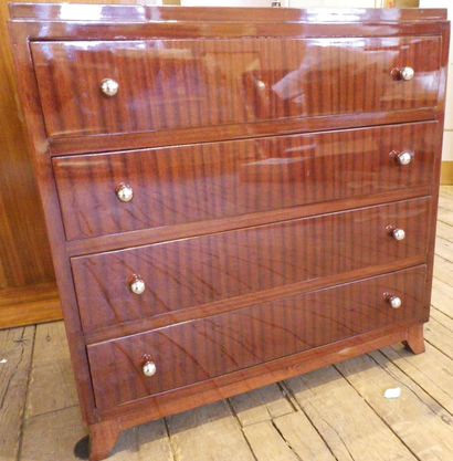 null 
Art Deco style chest of drawers in varnished wood, four drawers with metal...