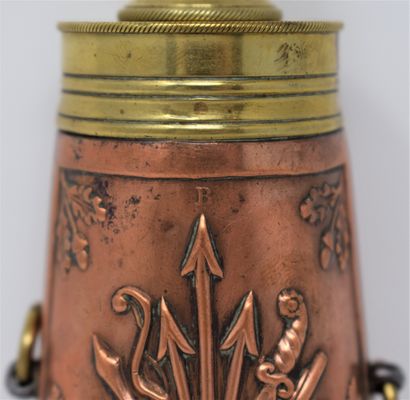 null Brass and copper embossed straight powder flask with cygetic decoration, signed...