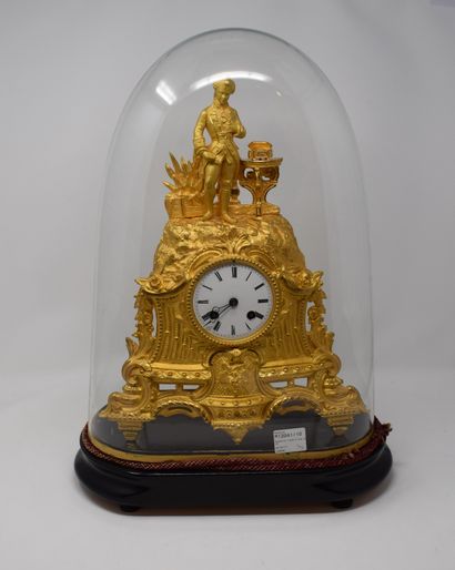 null Romantic ormolu clock decorated with a standing gentleman, a jewel box on a...