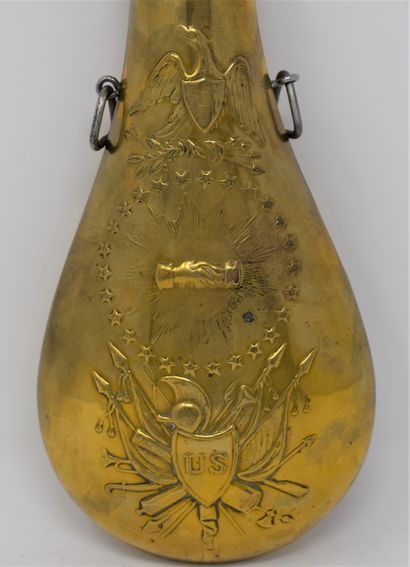 null Powder flask in embossed brass decorated with American patriotic attributes...
