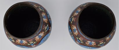 null 
A pair of cloisonné vases on a copper base, decorated with flowers, butterflies...
