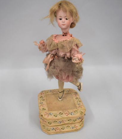 null 
Ballerina with unique base and bisque head made by HEUBACH with a uniform....