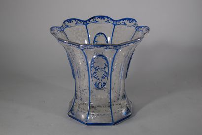 null A double-layered glass basket vase with eight sides richly engraved with scrolls...
