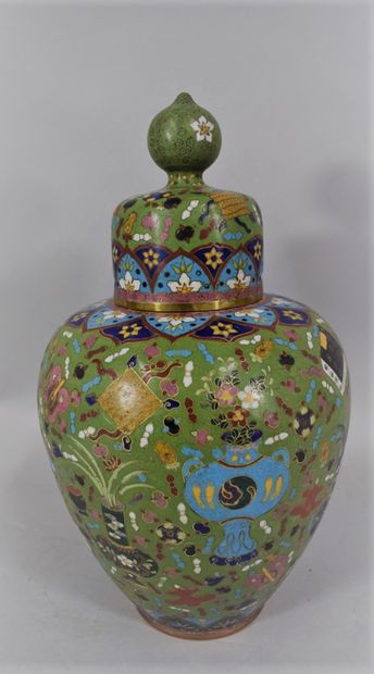 null CHINA, About 1900

A copper covered baluster vase in cloisonné enamel, decorated...