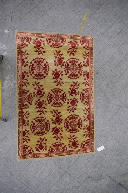 null 
Chobi carpet yellow background with red geometric decoration.

H: 192 cm -...