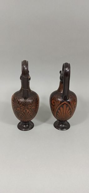 null Lot of two oenochoes with a spout and a high rigid handle. The scenes present...