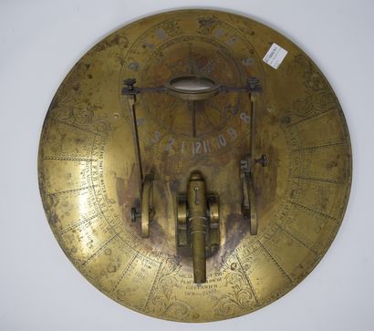 null Brass meridian gun or "canon de midi", circular base engraved with a sundial...