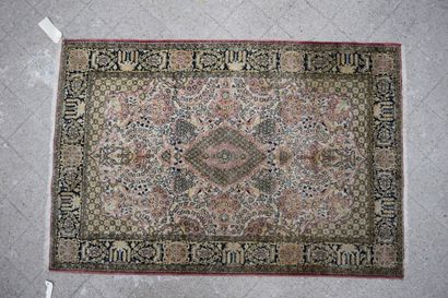 null 
Silk carpet on a white background, the borders on a black background.

H: 155...