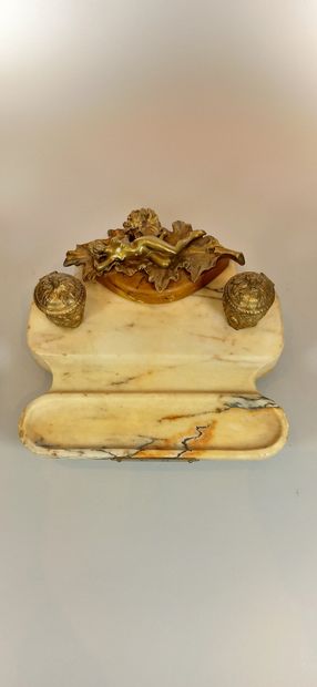 null GARNIER 

"Young languid woman". 

An ormolu inkwell on white marble and yellow...