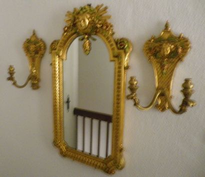 null A Louis XIV style gilt wood and metal mirror and pair of two-light sconces (...