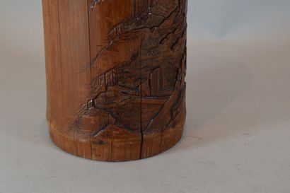 null Carved bamboo brush holder with landscape decoration. 

Accidents and cracks...