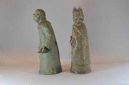 null Bishop and monk in sandstone