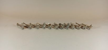 null Twelve silver plated knife holders showing birds

L. 8,5cm approx.