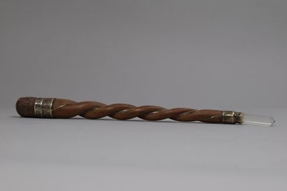 null SOUTH ASIA, Early 20th century.

Twisted wooden energy stick decorated with...