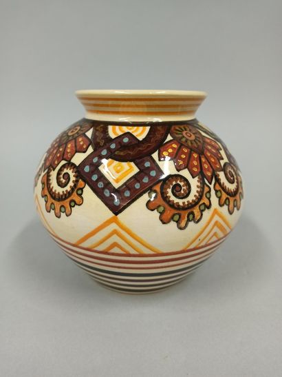 null PAUL FOUILLEN (1899-1958)

Ceramic ball vase with painted geometric decoration.

H....