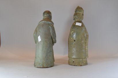 null Bishop and monk in sandstone