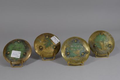 null Lot including:

- MAX LE VERRIER: 4 gilded bronze voids, signed. (D: 10 cm)...
