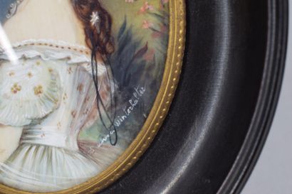 null 
Lot including: 




- 1 miniature representing a young woman signed after WINTERHALTER...
