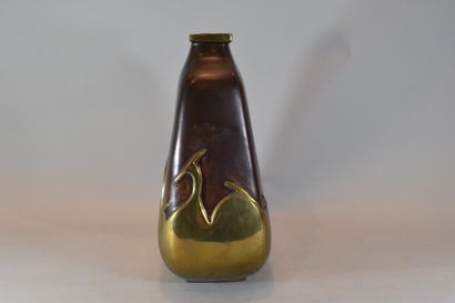 null Vase with 2 patinas, brown bronze and copper, decorated with stylized Antelopes

Slight...