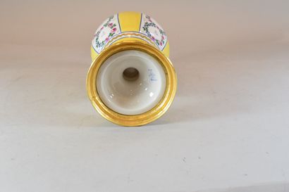 null Pair of porcelain baluster vases with yellow background and polychrome decoration...