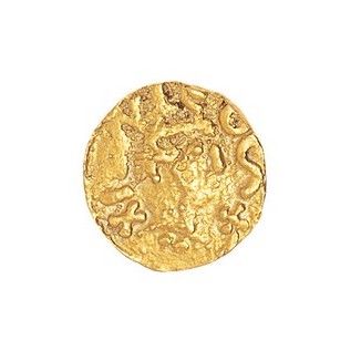 null Triens d'or Quentovic monétaire DUTTA. 

Coin rouillé, TTB. 

Poids : 1.33 g....