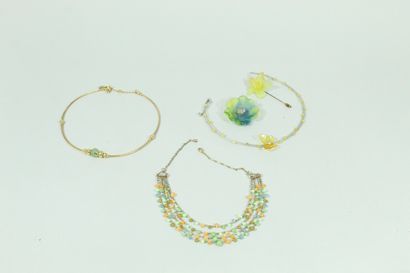 null Lot of fancy jewelry including a tie pin, three necklaces one of them decorated...